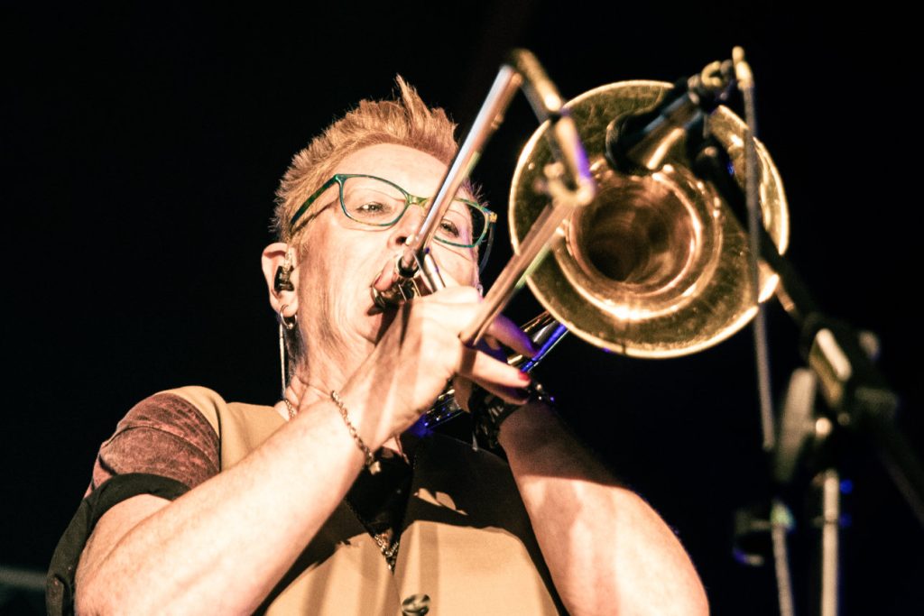 Dub Catalyst trombone player Caz performing live, close-up archive photo, Lakefest 2025